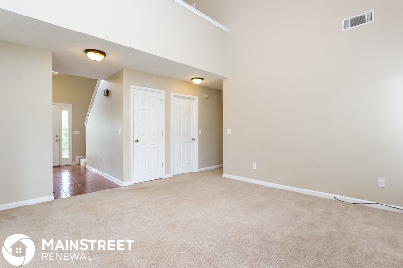 the living room and dining room are spacious and clean