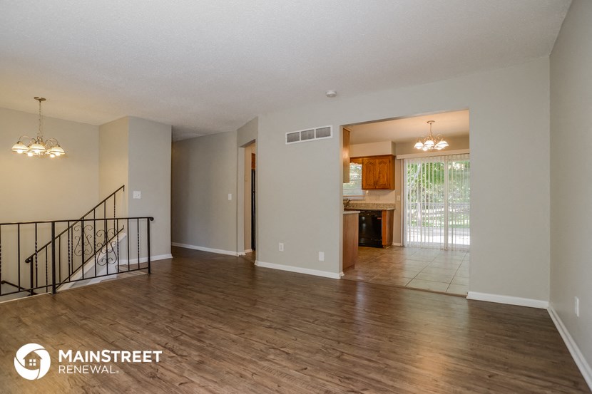 the living room and dining room are open to the kitchen andoyer