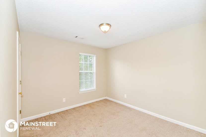 the spacious living room is clean and ready for you to use