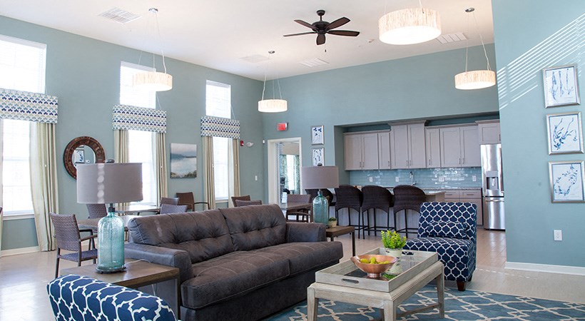 a living room with a couch and a table