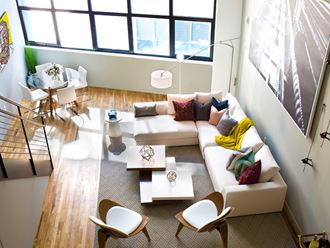 a living room with a couch and a table