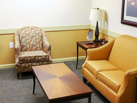 a living room with a couch and a coffee table