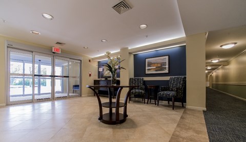 Entry way with table and chairs