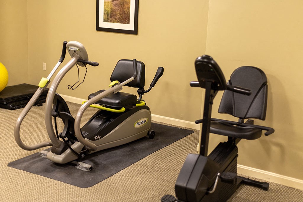 Modern on-site fitness center at Park View at Randallstown featuring exercise equipment designed to support active, healthy lifestyles for senior residents.