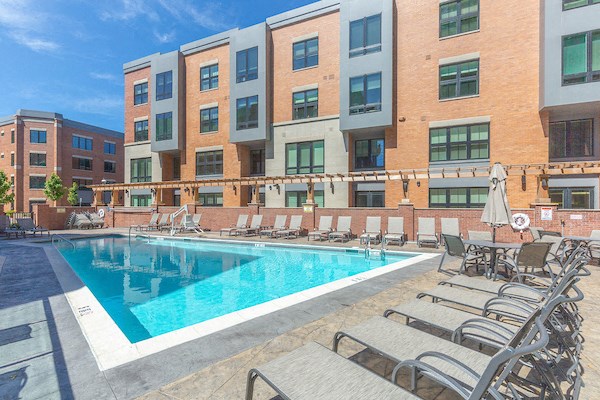 our apartments have a large pool and lounge chairs