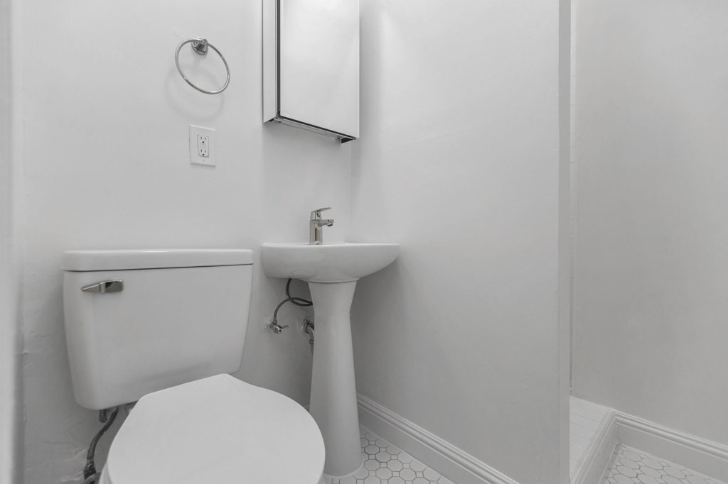 a small bathroom with a toilet and a sink