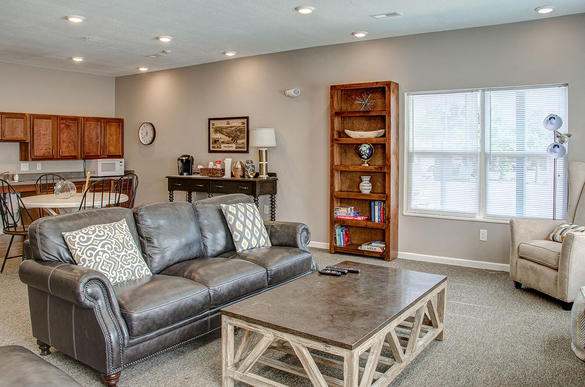 a living room with a couch and a coffee table