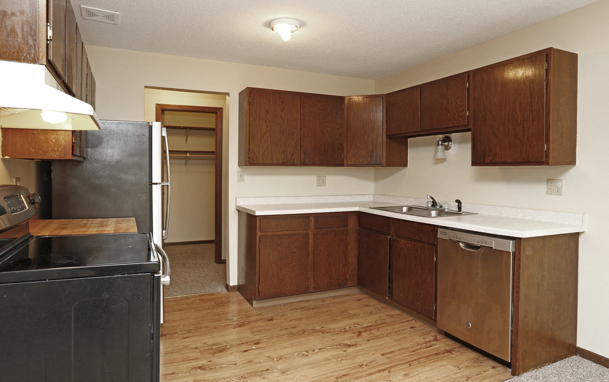 Sunrise Courts Apartments counter cupboard kitchen space