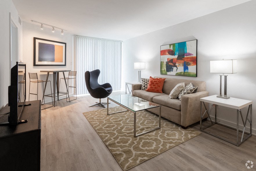 a living room with a couch and a table