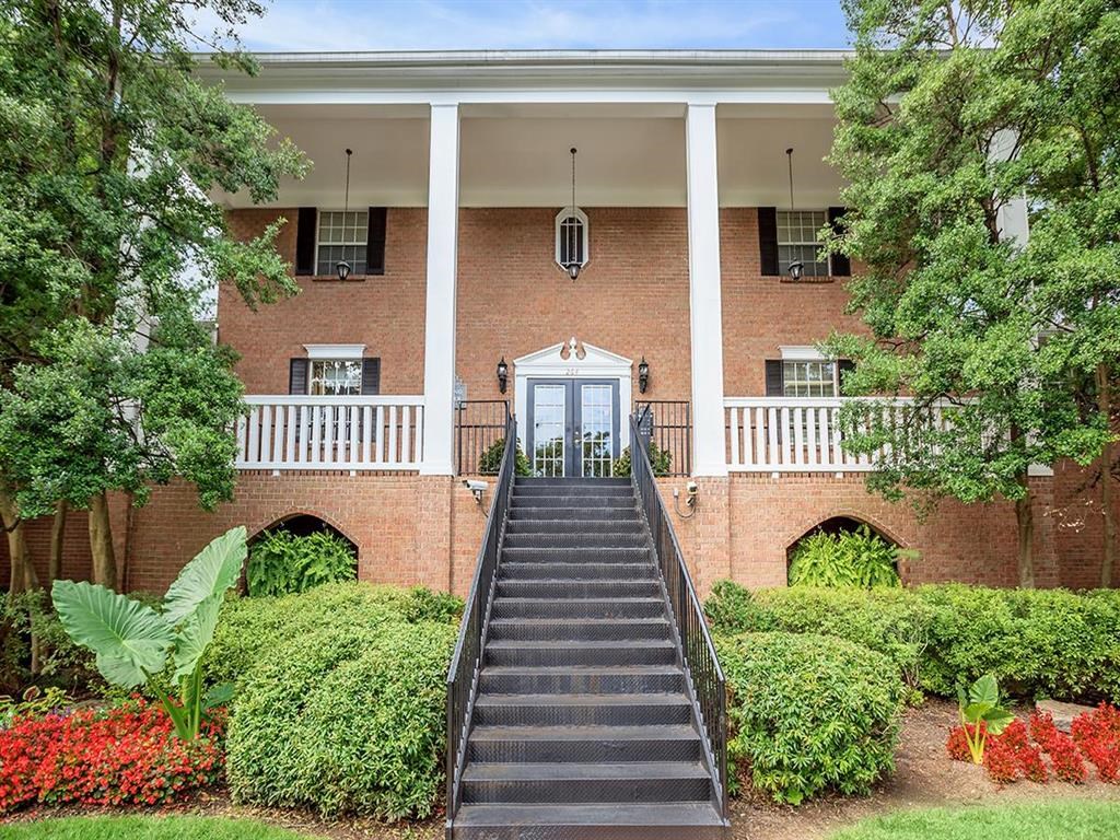 a large building with a staircase in front of it