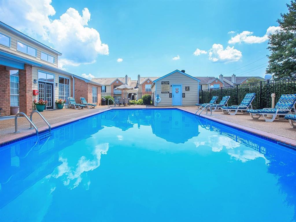 the swimming pool at the apartments for rent