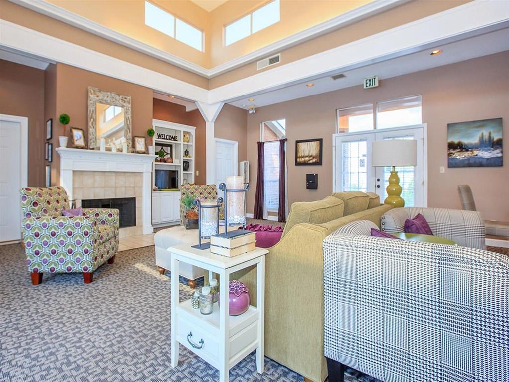 a living room with a couch and a bed