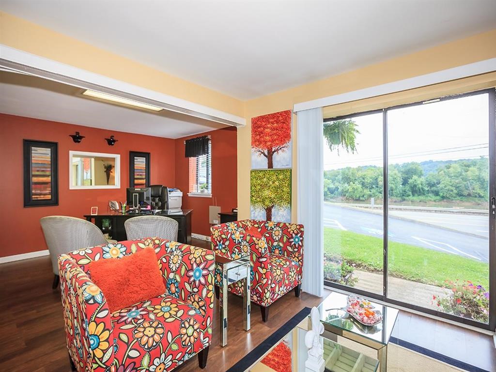 a living room with a couch and a table