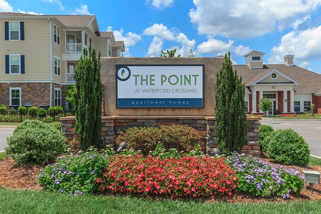 the point sign in front of building
