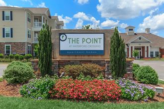 the point sign in front of building