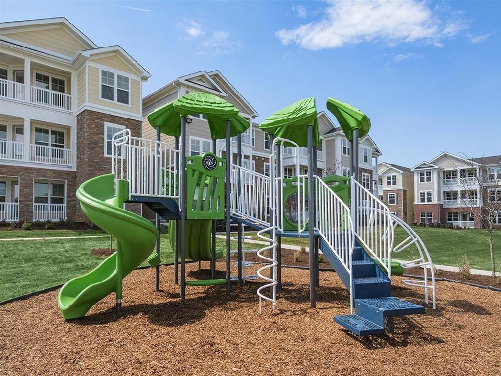 our apartments have a playground with a slide and other playsets
