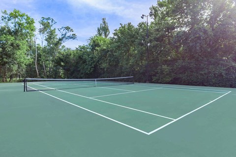 a tennis court with a net on top of it