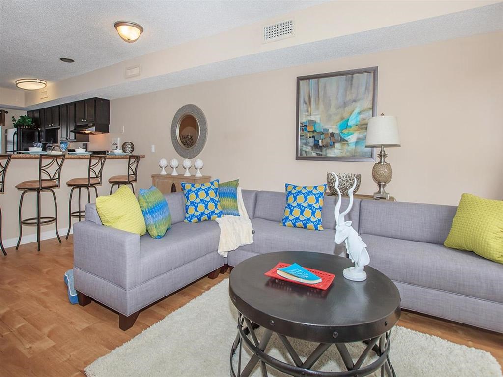 a living room with a couch and a table