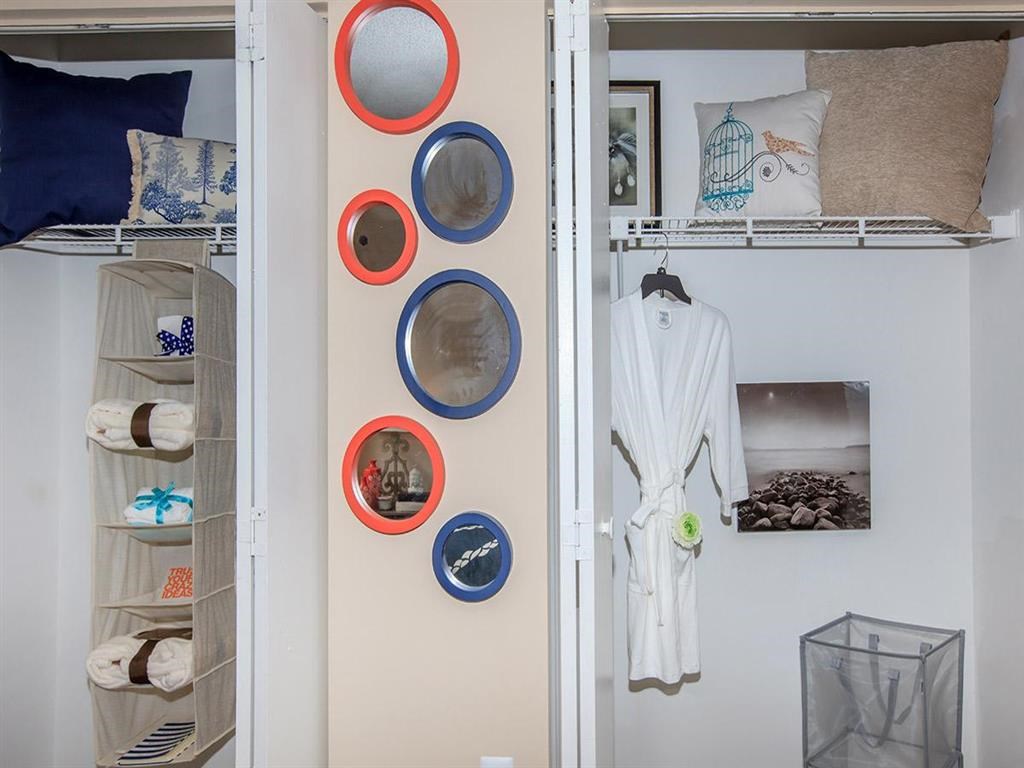 a closet with red and blue circles on the wall