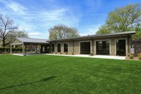 a large lawn in front of a house