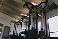 a gym with weights and a large window