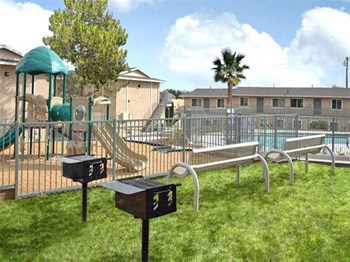 BBQ are and Playground Rendering l Casa Bella Apartments in Victorville CA - Photo Gallery 5