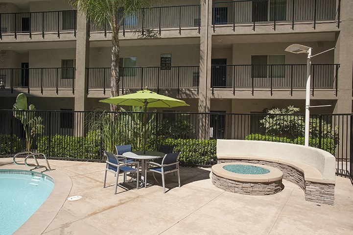Pool with lounge chairs  l Davinci Apartments 