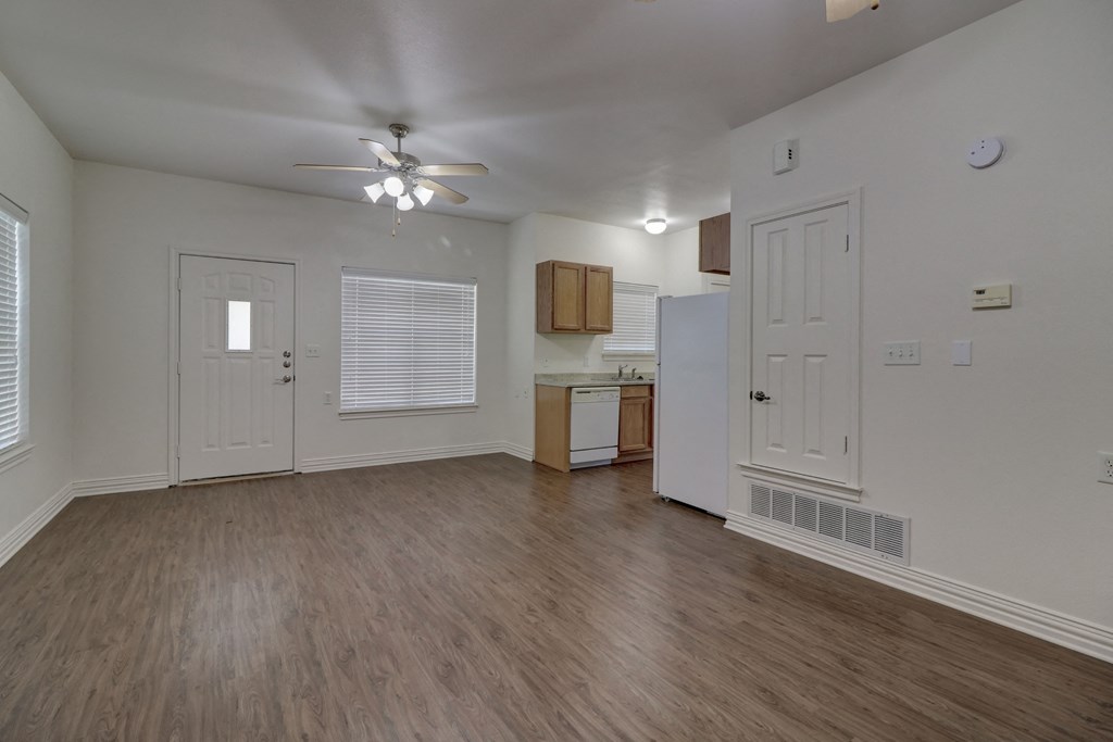 Bright and inviting living room with modern finishes at Legend of Lindale