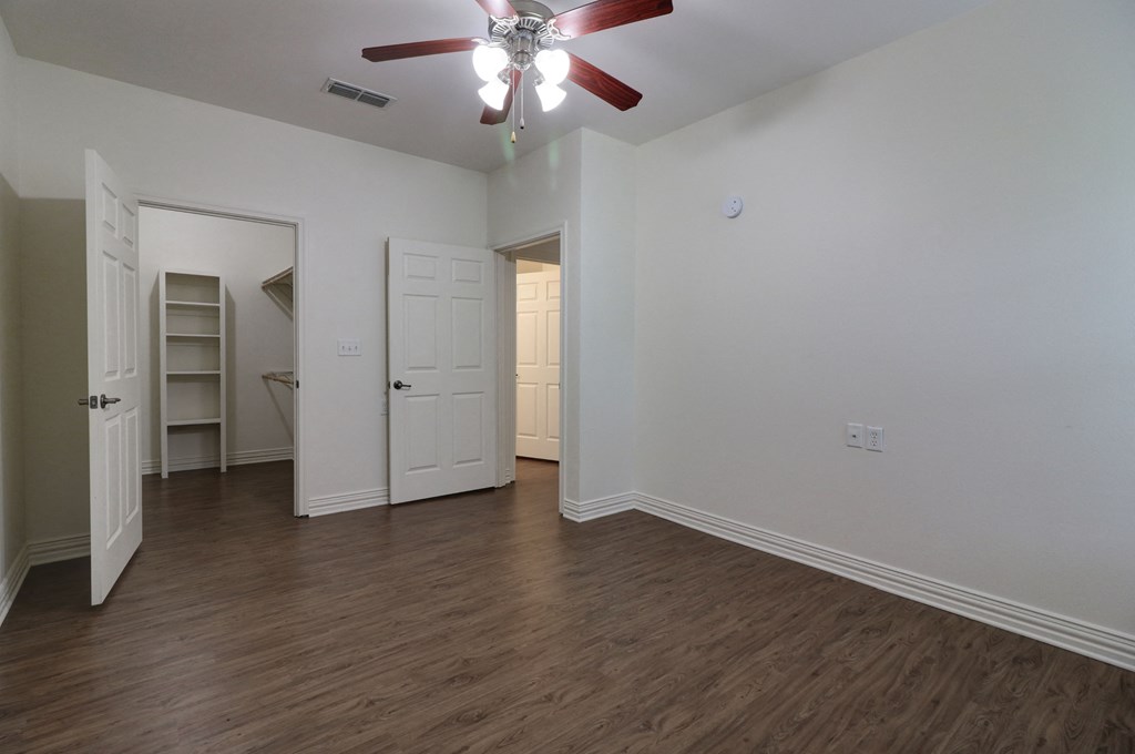 Spacious bedroom at Legend of Lindale, designed for 55+ senior living comfort