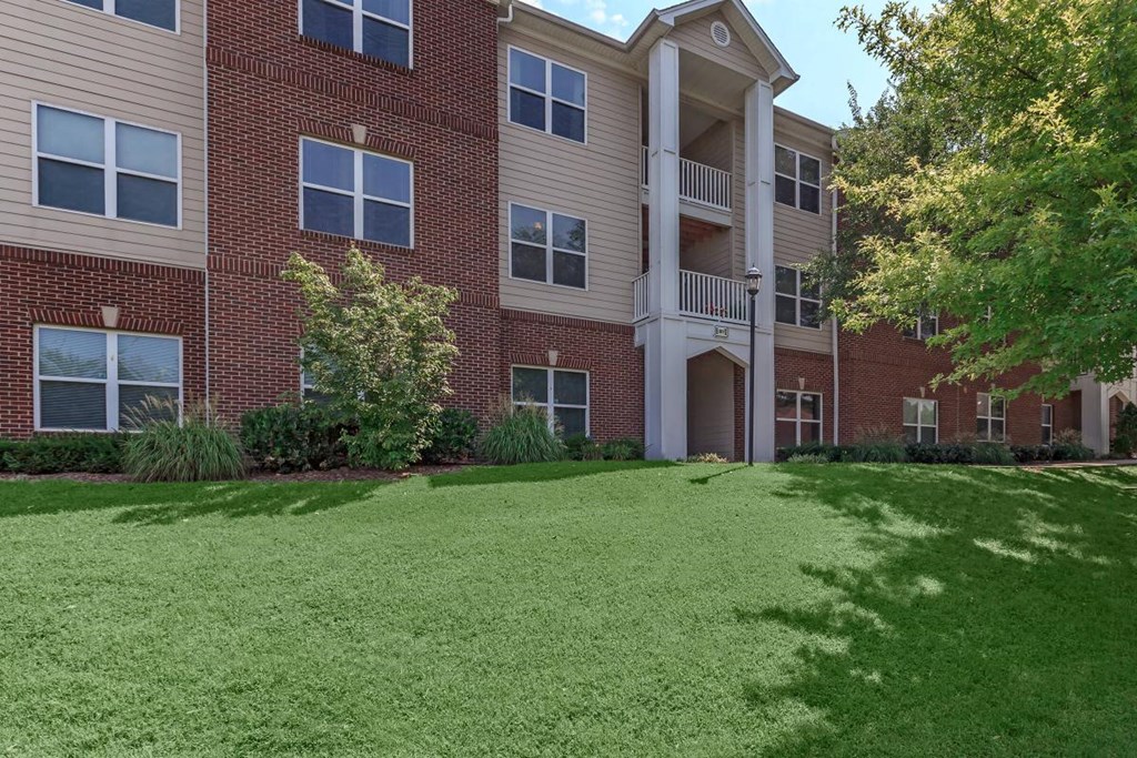 our apartments have a large green yard in front of our building