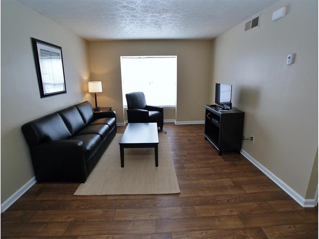 a living room with a couch and a coffee table
