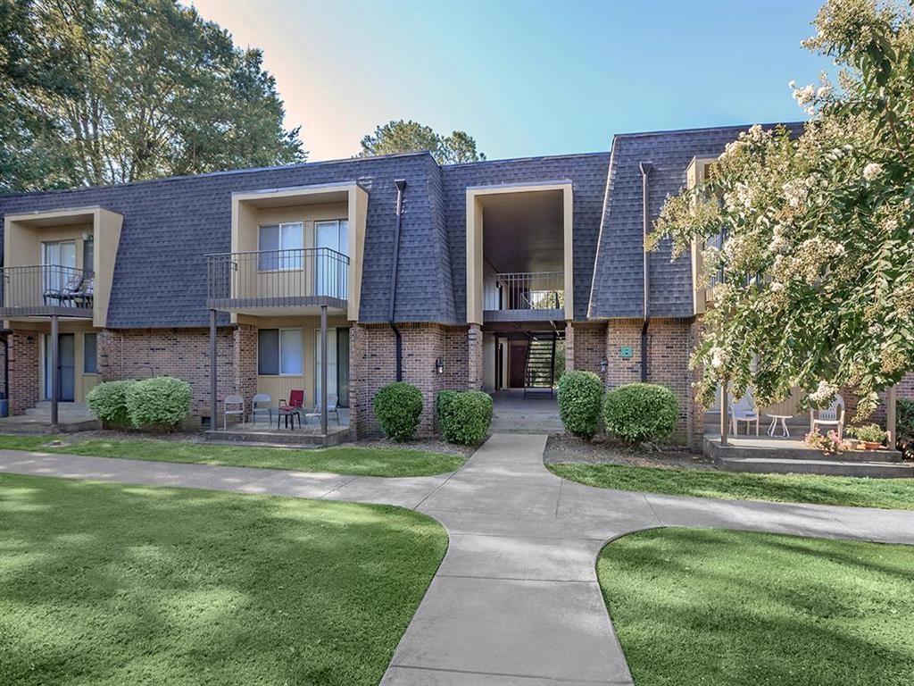 our apartments are located in a quiet neighborhood with green grass