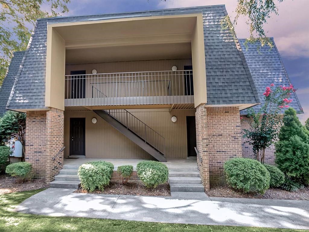 a building with a balcony on the side of it