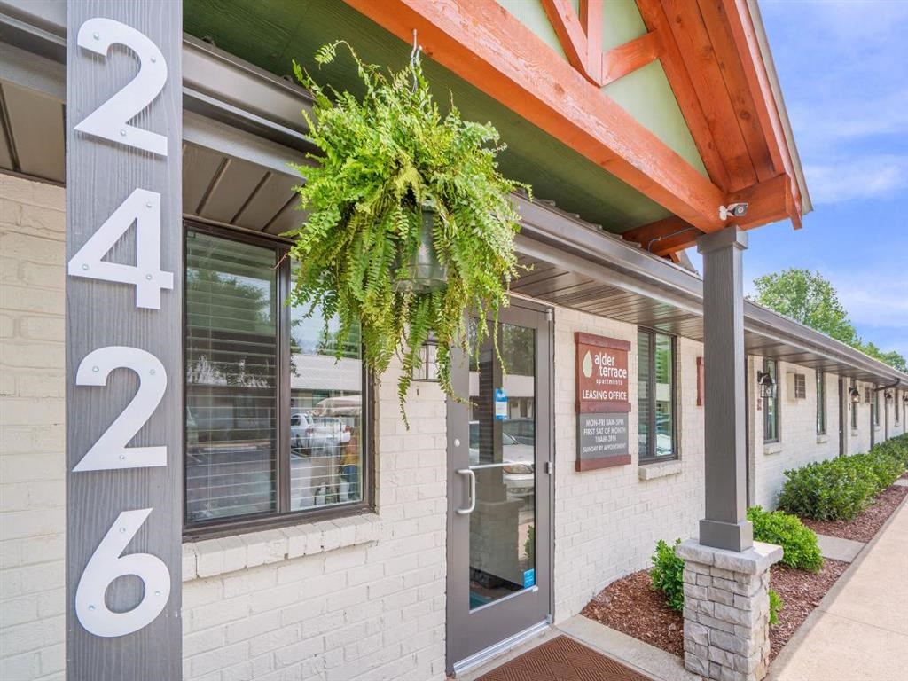 the front of a building with numbers on the side