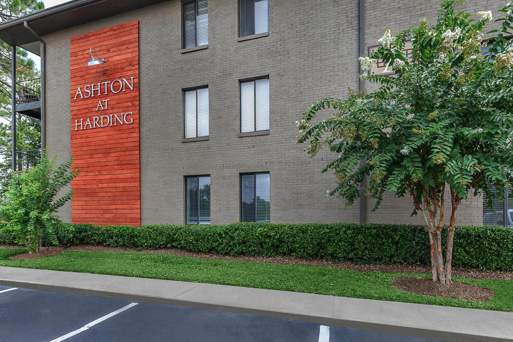 a building with a sign that says at hacking