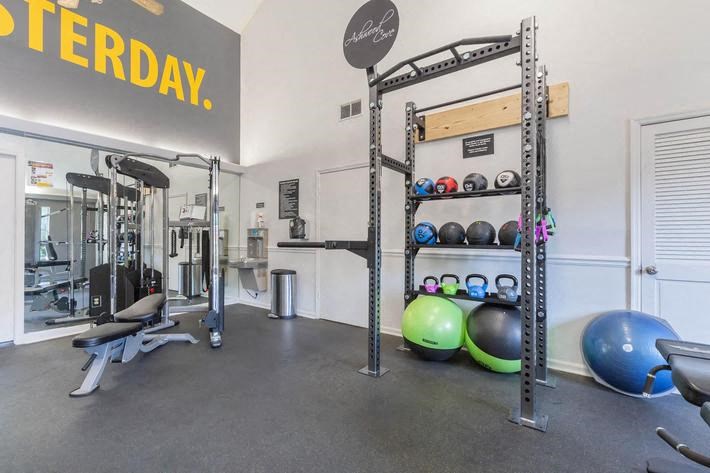 the gym is equipped with weights and other exercise equipment