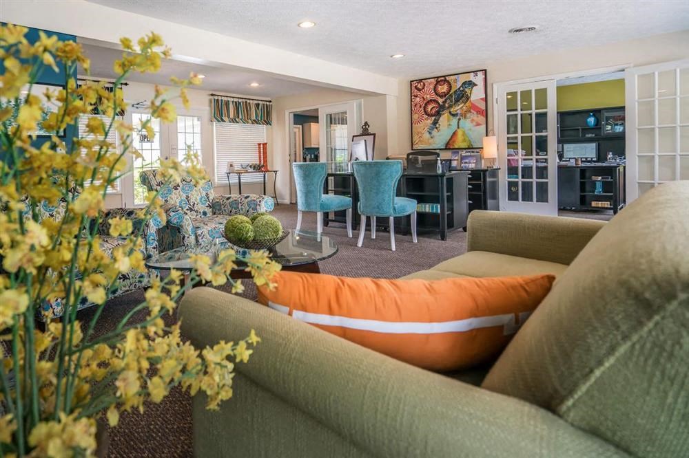 a living room with a couch and a table