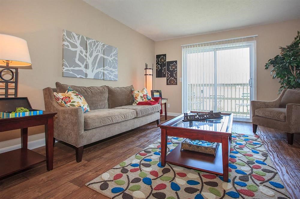 a living room with a couch and a table