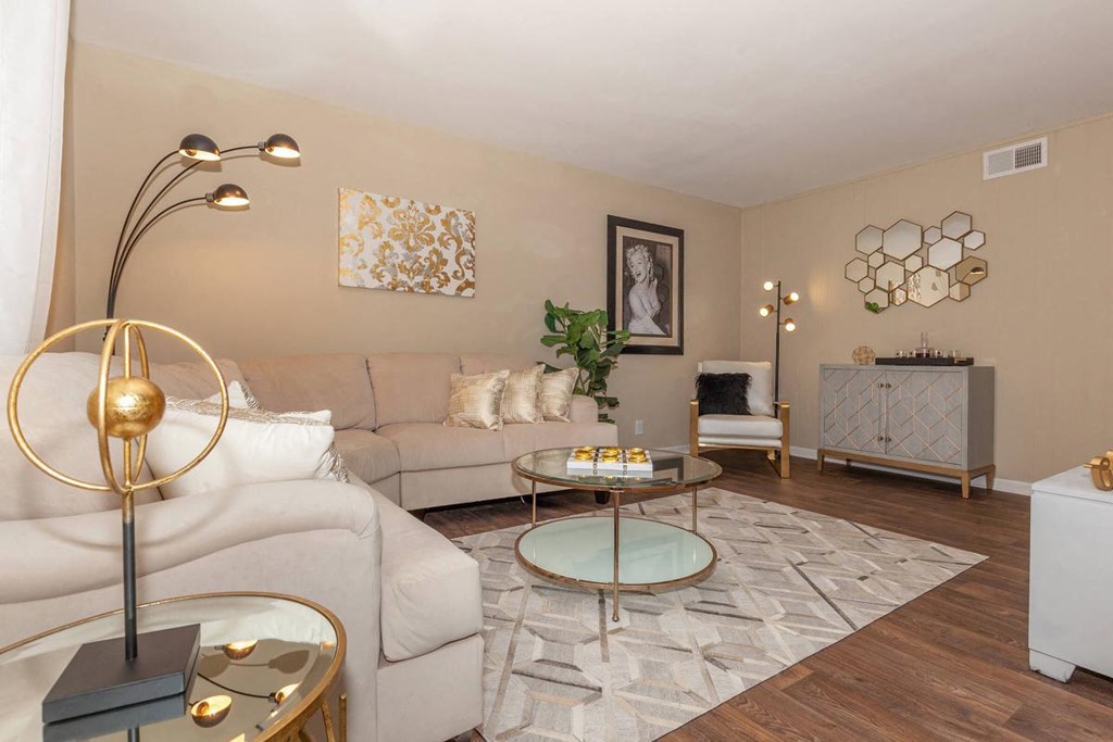 a living room with a couch and a table