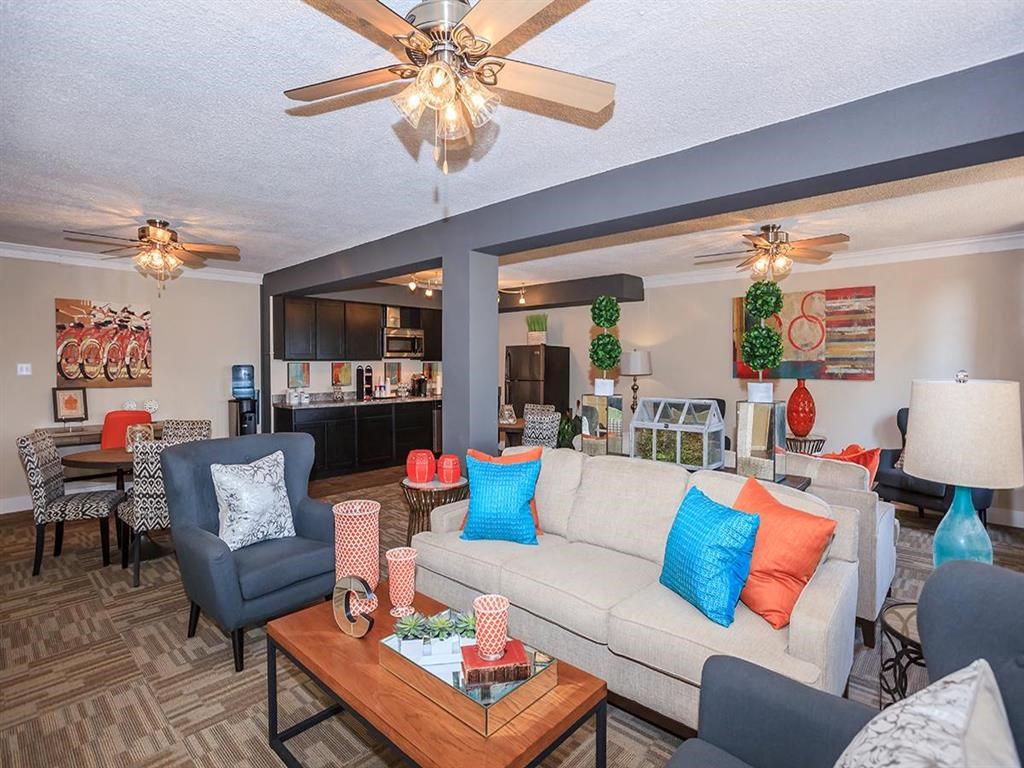 a living room with a couch and a table