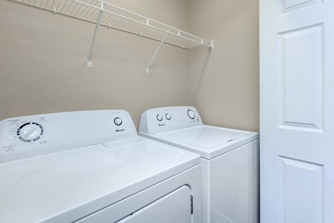 a washer and dryer in the laundry room of a home