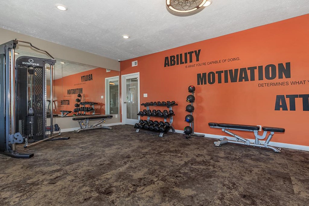 the gym at the residence on lamar apartment homes