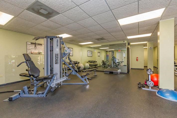 a gym with weights and other exercise equipment