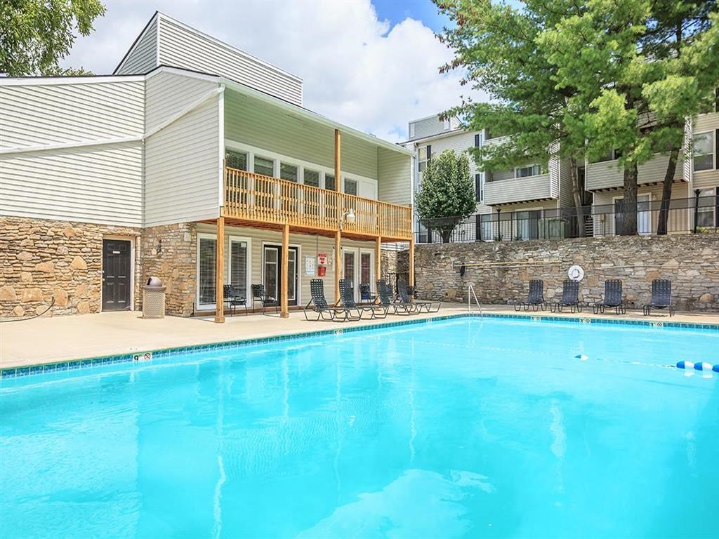 the swimming pool at the resort on a sunny day