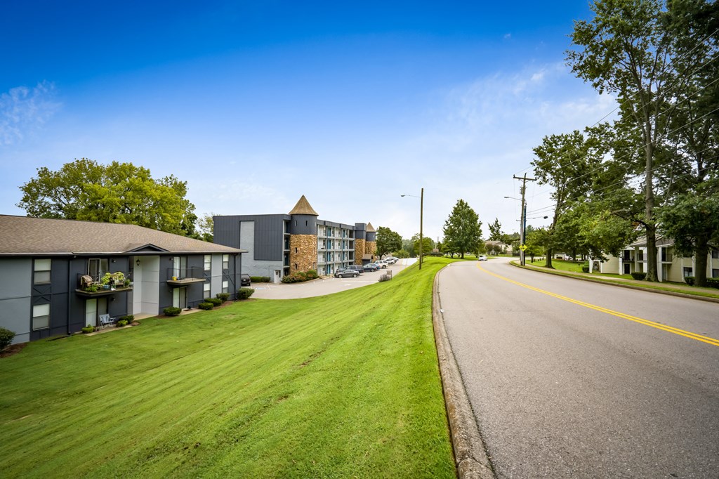 a street with houses on the side of a road