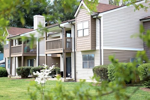 a view of the exterior of an apartment building