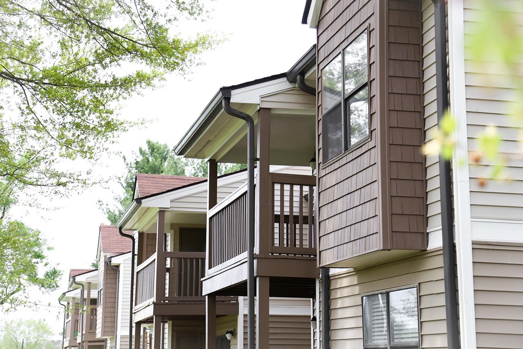 a row of houses with balconies
