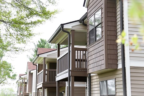 a row of houses with balconies