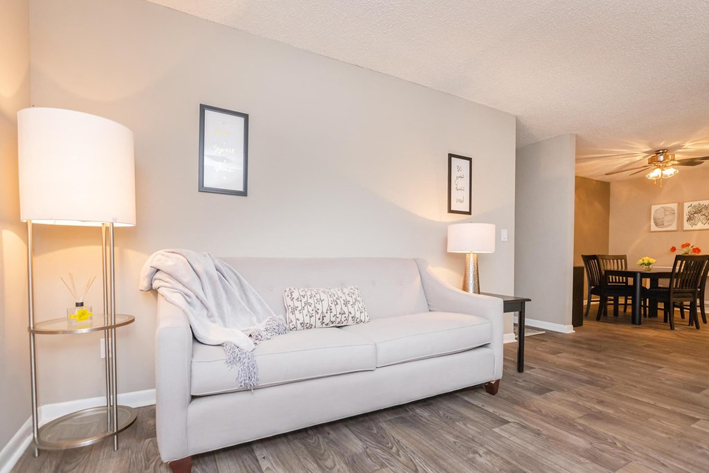 a living room with a couch and a table
