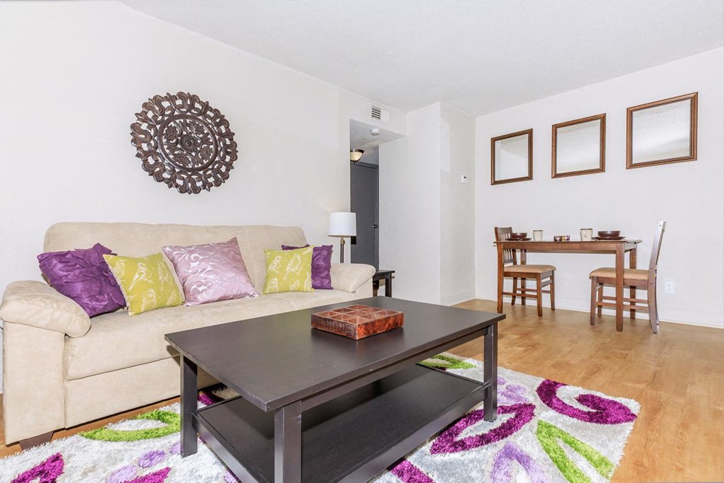 a living room with a couch and a coffee table